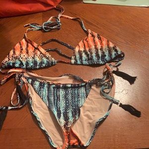 TART SWIM Side tie bikini with tassels. Like new!